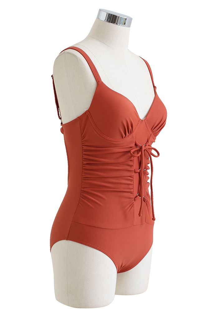 Ruched Lace-Up Front Open Back Swimsuit in Rust Red