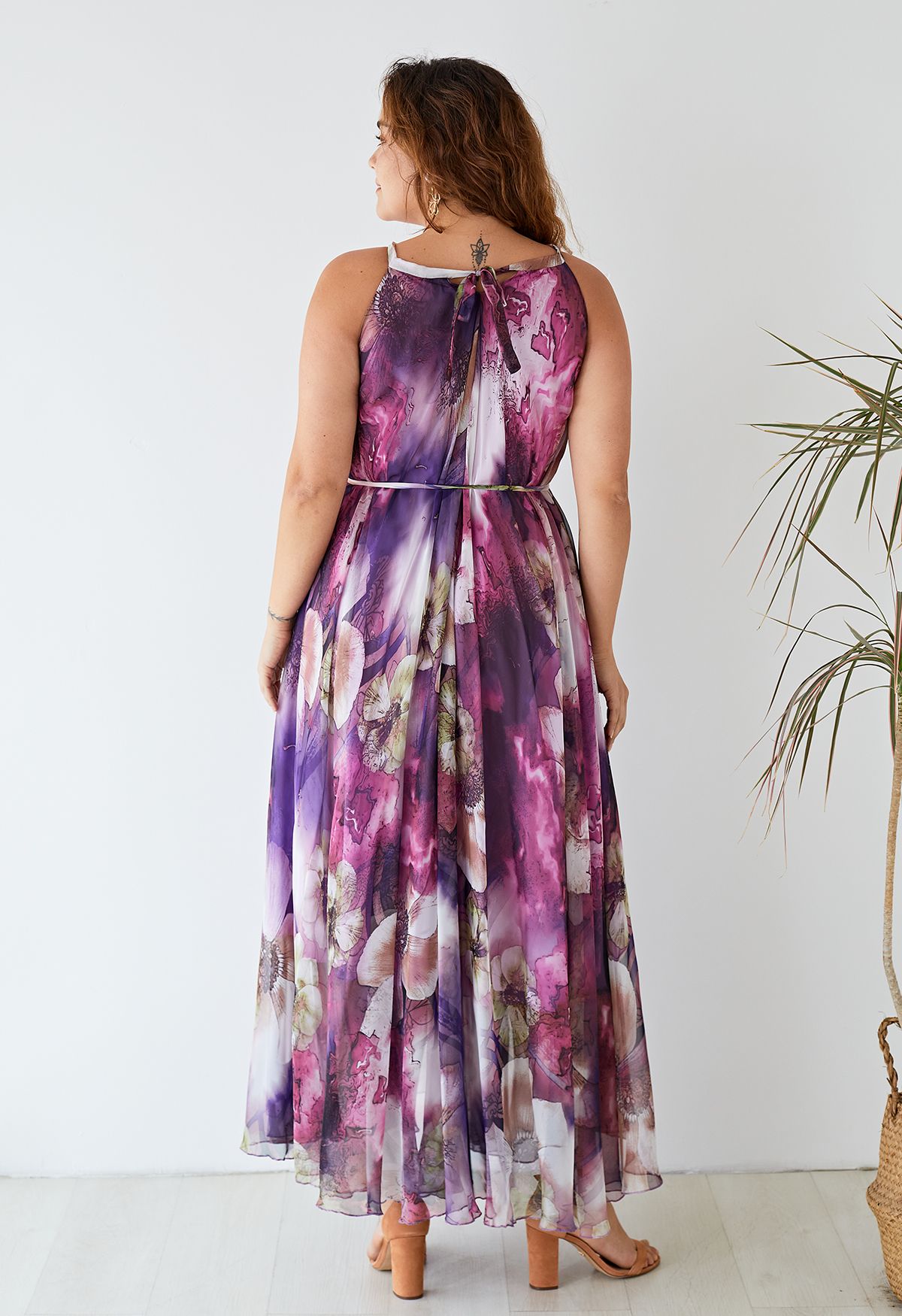 Vestido midi floral morado misterioso